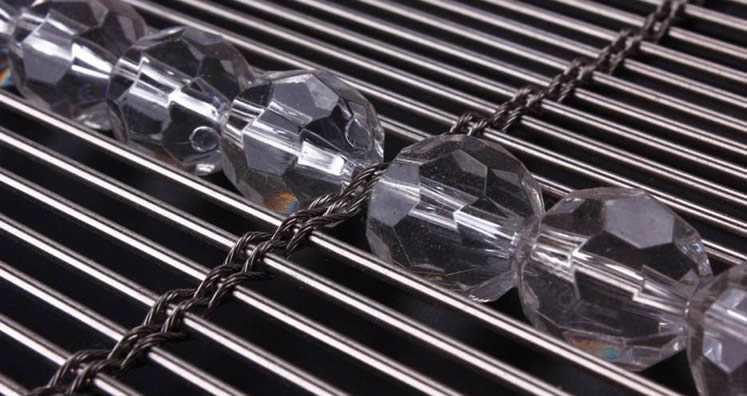 A piece of media metal mesh without LED with transparent balls on it.